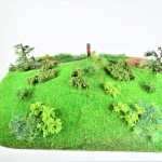 Diorama: Wiesenhügelhaus blau